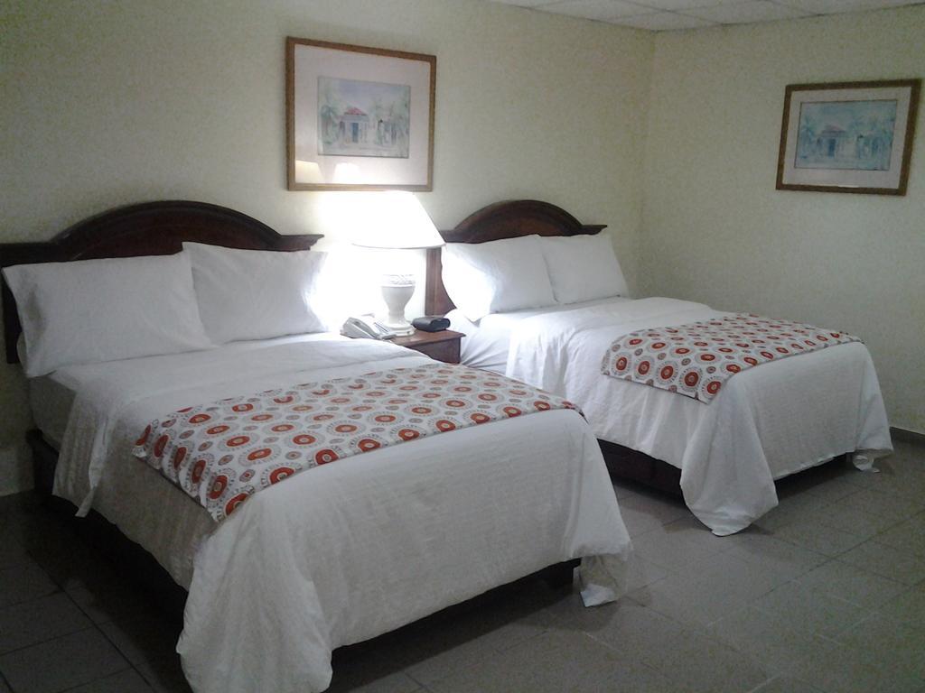 Micro Hotel Condo Suites Santo Domingo Værelse billede