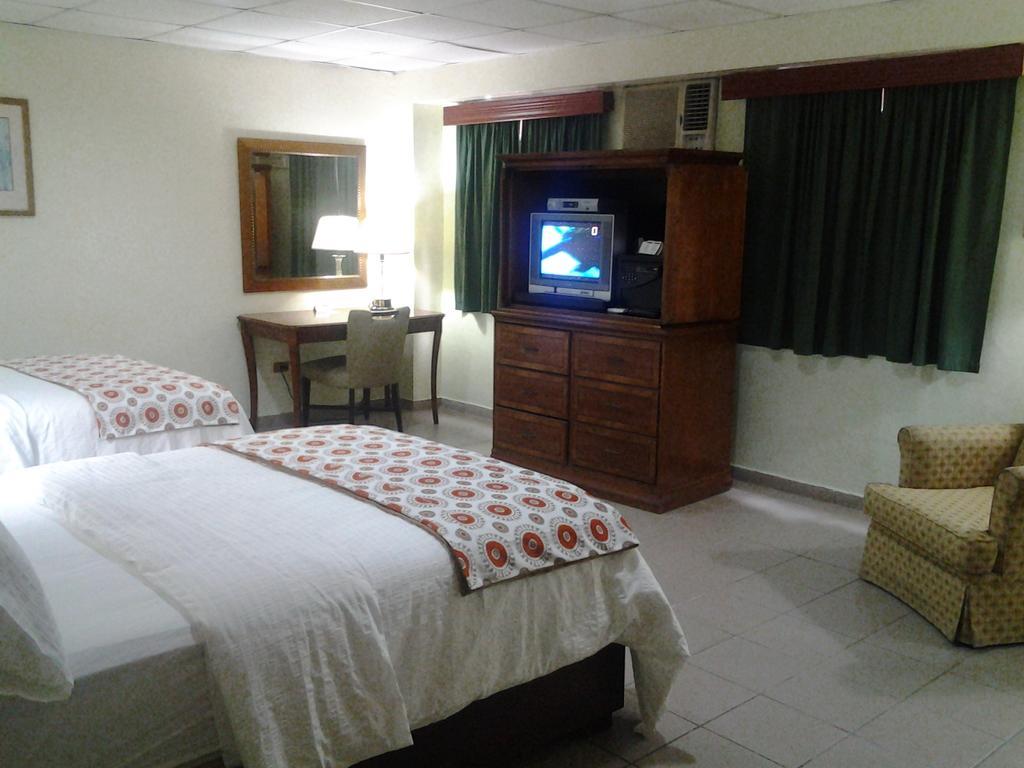 Micro Hotel Condo Suites Santo Domingo Værelse billede